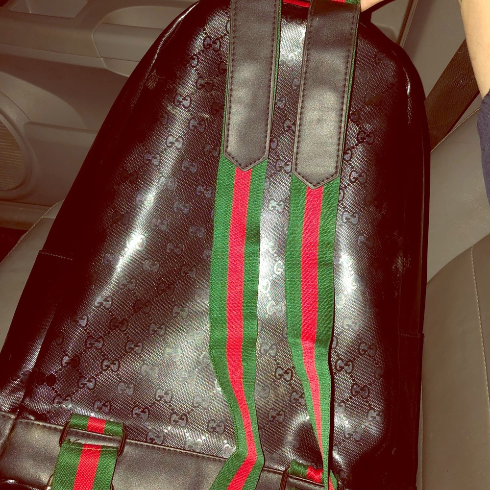 Black Gucci bag auethentic asking 650